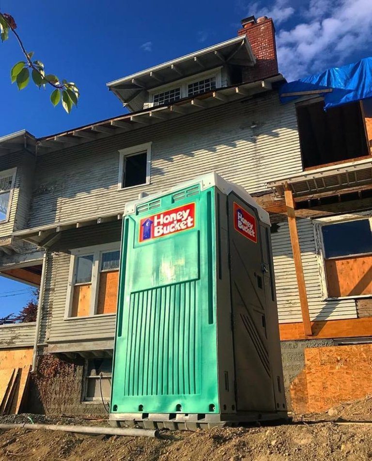 Honey Bucket Portable Toilet at construction site